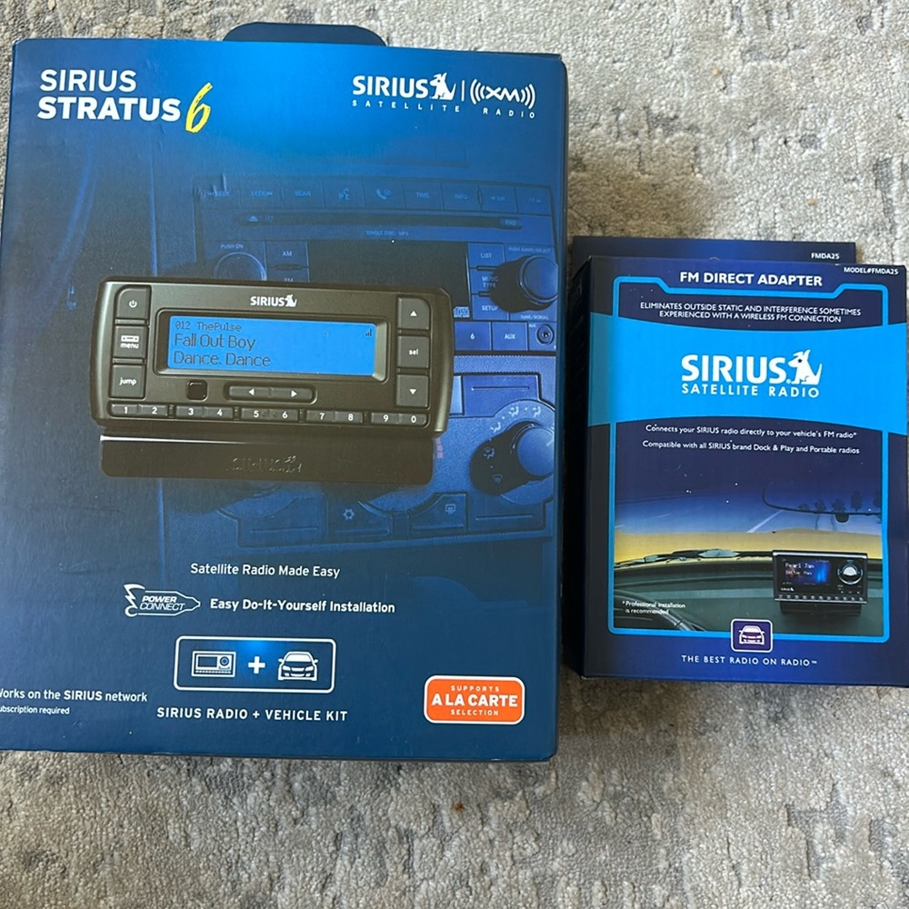 Sirius vehicle kit and adapter in never been opened box.